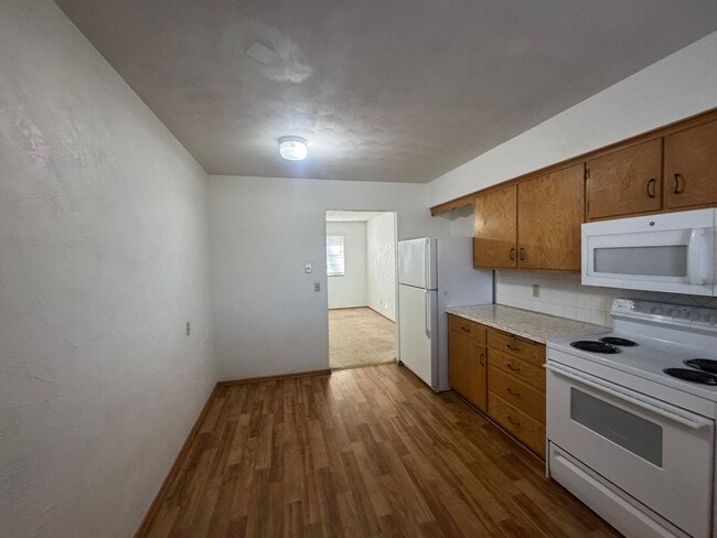 Photo - ***6 OR 12 MONTH  LEASE OPTIONS***4BR 2BA Home w/ Central Air • Porch • Great Location in Indepen...