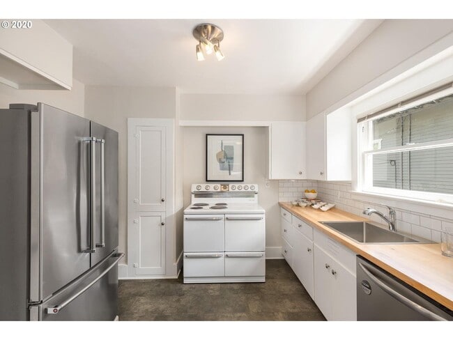 Photo - Charming 2-Bedroom Gem with Spacious Living Room and Bright Open Kitchen!