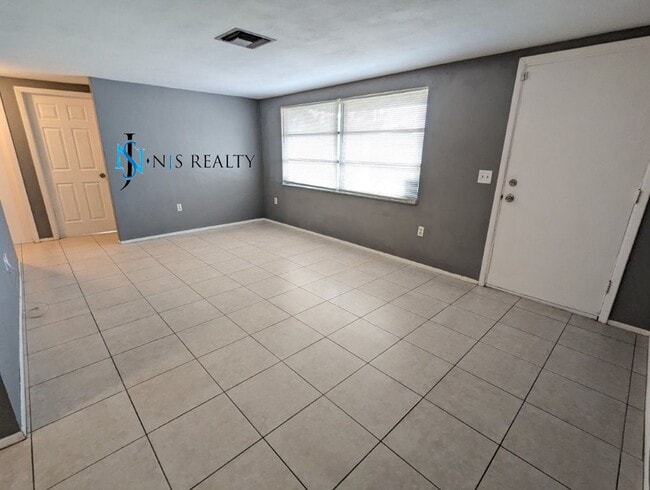 Photo - Large 1270 Sq. Ft. 3/2/1 tile floors, walk-in-closet, indoor laundry, fenced yard and spacious ki...