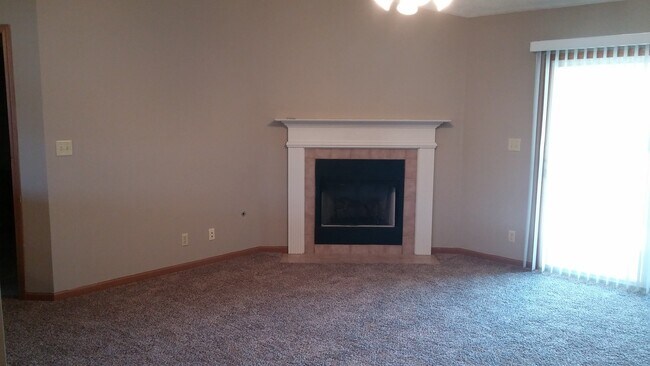 Photo - Spacious 2BD 2 BA duplex with 2 Car attached garage. Just a few steps away from everything you need!