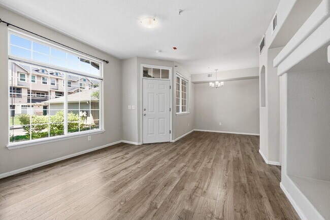 Photo - $1,745.95 - Ground-Level 1 Bed + Flex Room | 1.5 Bath Condo with Community Pool Unit #1072