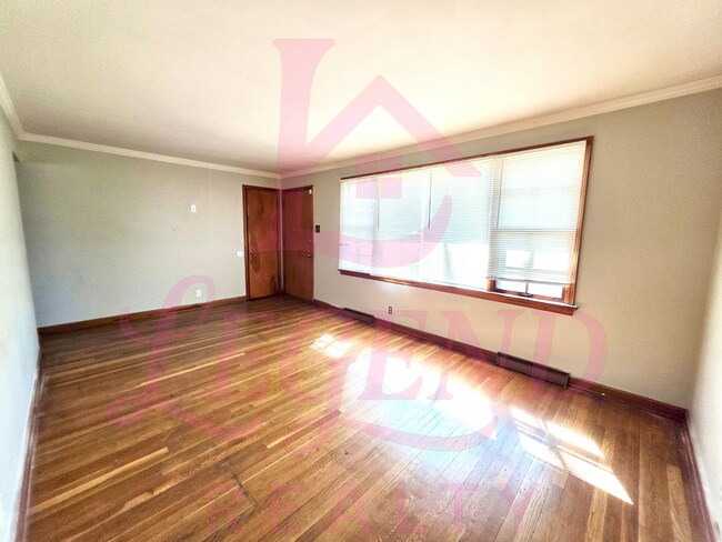 Photo - Move-In Ready 2 Bed Home with Sunroom, Garage & Fenced Yard