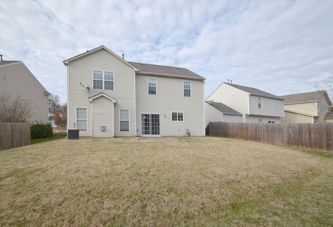 Photo - 1/2 MONTH FREE! ?Upgraded 4BR with Brand New Flooring & Private Backyard – Available Feb 15