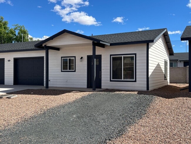 Photo - Dual Primary Suites & 2 car Garage Unit 2