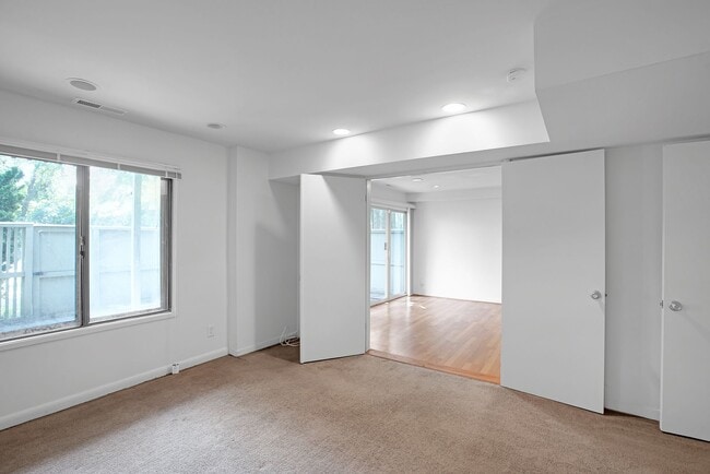 double doors to bedroom - 5224 Pooks Hill Rd Unit Bethesda Luxury Condo