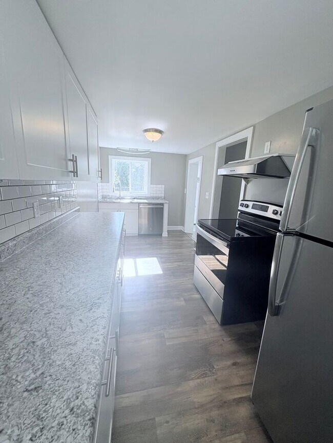 Photo - Charming 3BR 1BA Home w/ Sunroom • Stainless Kitchen • Yard w/ Fire Pit in Delaware