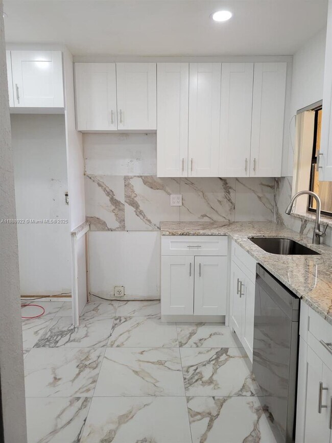 Photo - 3883 Coral Tree Cir Unit 3883