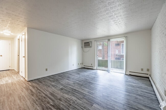 1 habitación, 1 baño - 872 pies cuadrados - Sala de estar - Oaks Apartments