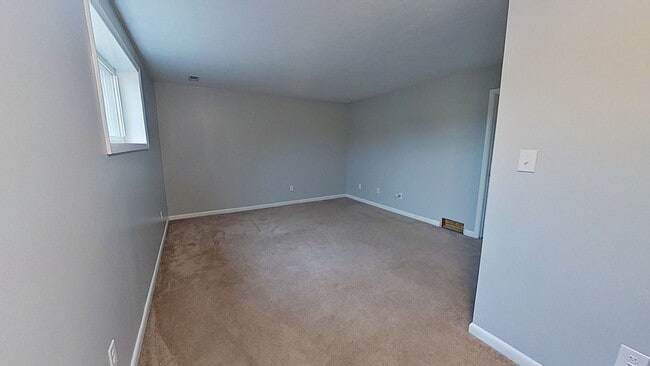 Photo - Move-In Ready 2BR Townhouse w/ Central AC & Off-Street Parking