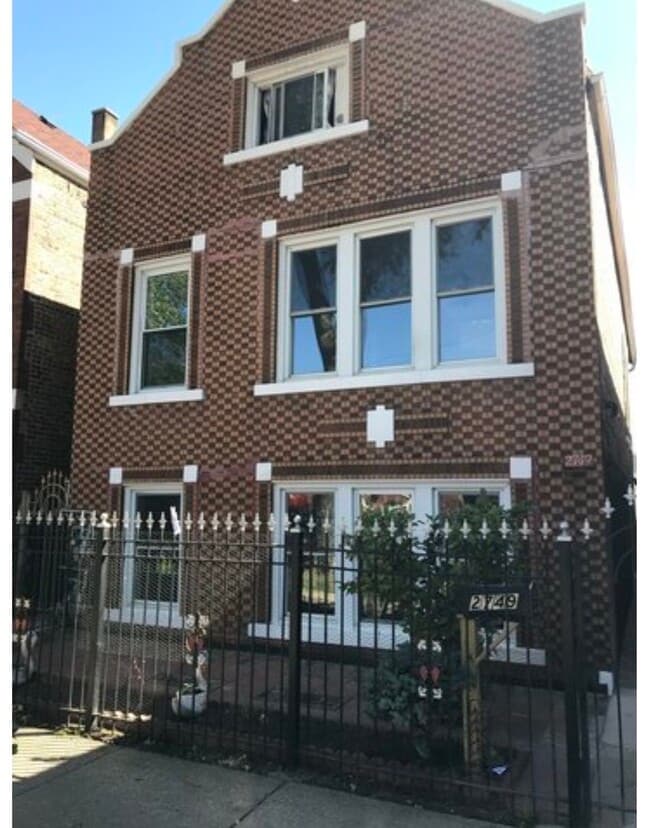 Building Photo - 2749 S Trumbull Ave Unit 1
