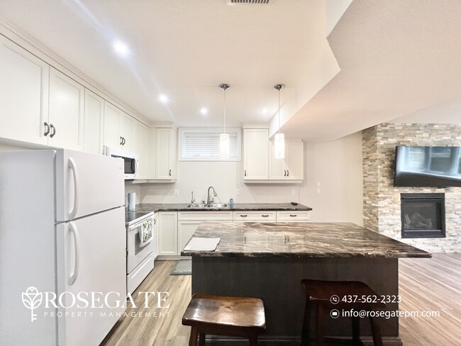 Photo - Stylish 2-Bedroom + Den Home with Backyard... Unit 2