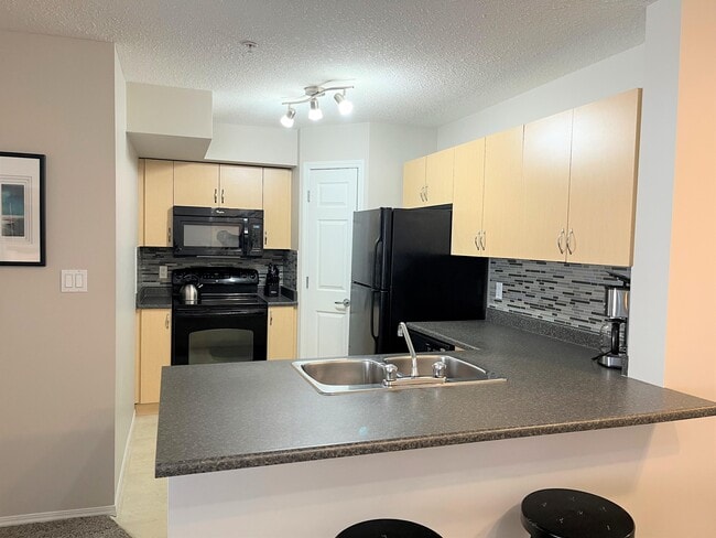 Photo - 42-242 Summerwood Blvd
