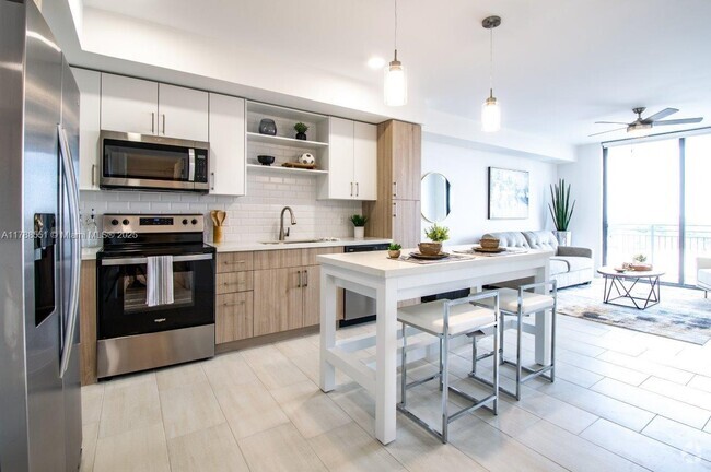 Building Photo - 3645 NW 36th St Unit 428 Rental