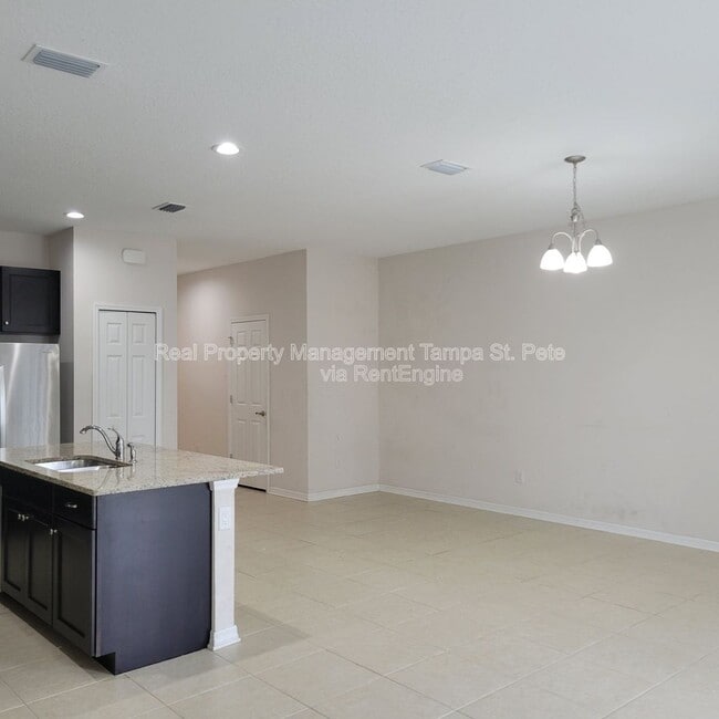Photo - 6409 Tillandsia Pl