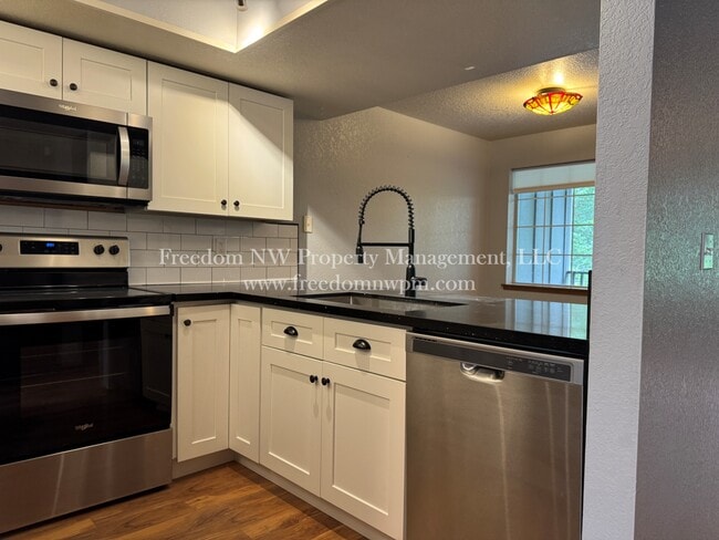Building Photo - 2818 60th Ln SE Rental