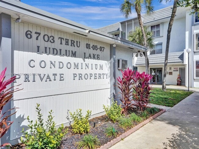 Building Photo - 6705 NW 169th St Unit C112