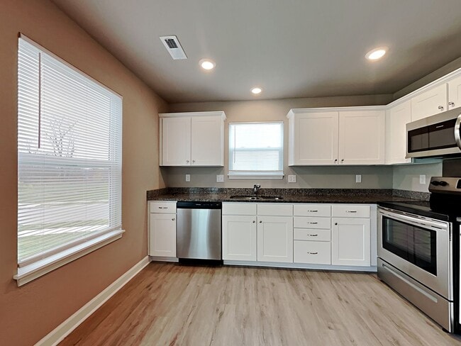 Photo - 3 BR/2.5BA | Newly Renovated Single Family Home | 1-Car Garage Parking | Community Pool!