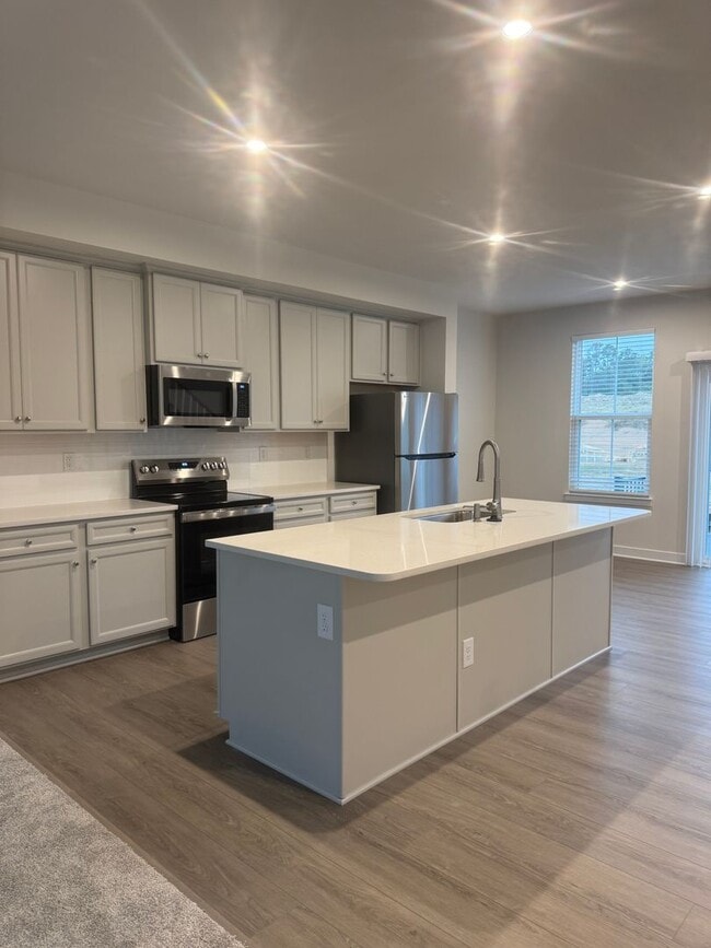 Photo - Brand New 3BR 2.5BA Townhome w/ 2-Car Garage • Modern Kitchen • Private Deck in Indian Trail!