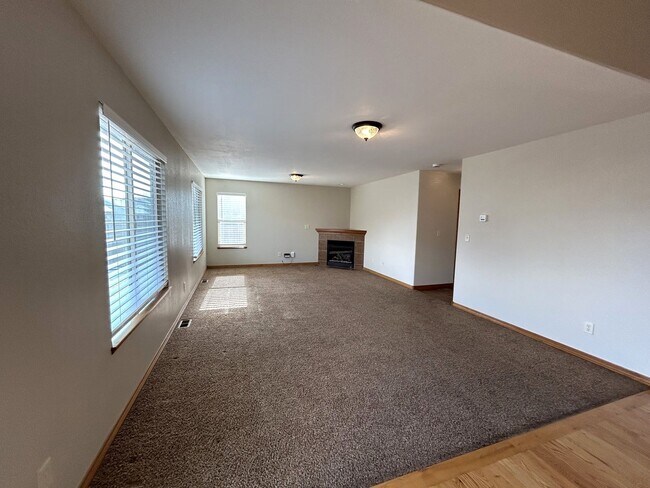 Photo - Spacious 5-Bedroom Home with Finished Basement and 3-Car Garage in Wellington