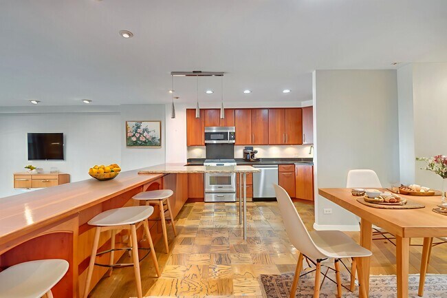 Building Photo - 1200 N Nash St Unit 229