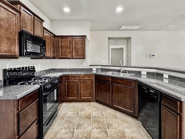 Photo - 3 Bed/2 Bath Home with Fenced Yard & Garage / Pet-Friendly / Available Soon!