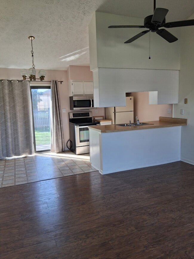 Dining-Kitchen-Patio - 1858 Queensbridge Cir Unit 1858