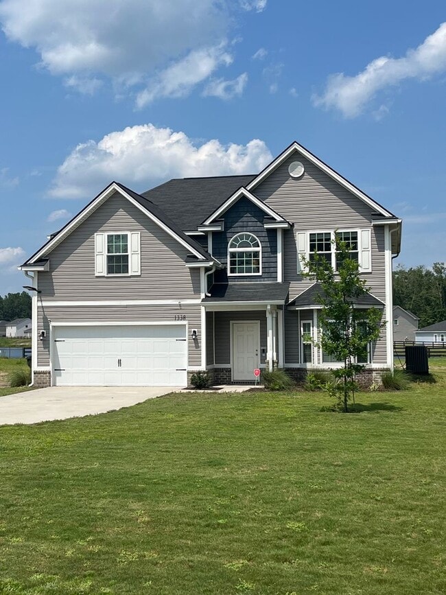 Photo - Spacious 4-Bedroom Pet Friendly Home with a Serene View - Available for Rent!