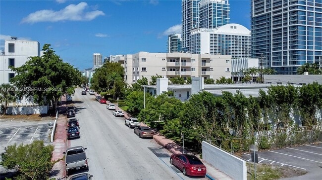 Building Photo - 6801 Harding Ave Unit 209