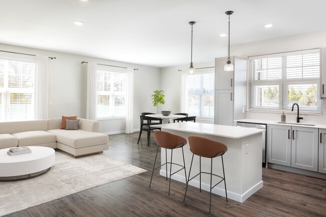Kitchen and living/dining area with hard surface flooring - Avalon Amityville