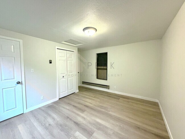 Photo - Cozy Oak Bay Retreat: Bright 1 Bedroom With Wood Stove and Private Deck