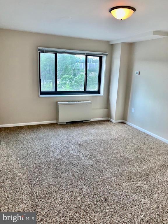 Building Photo - 1300 S Arlington Ridge Rd Unit 205