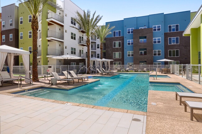 Sun, swim, and socialize. The Garrett Uptown resort pool offers sparkling blue water, shaded cabanas, and plenty of loungers, making it easier to escape at home in Chandler, Arizona.
