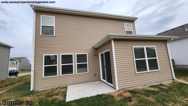 Photo - "Modern Luxury: Spacious 4-Bedroom Home with Open-Concept Design"