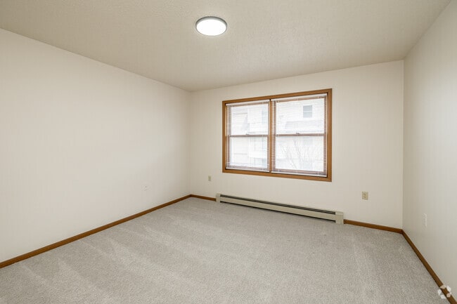 2BR, 1BA - 936SF - Primary Bedroom - Trollwood Village Apartments
