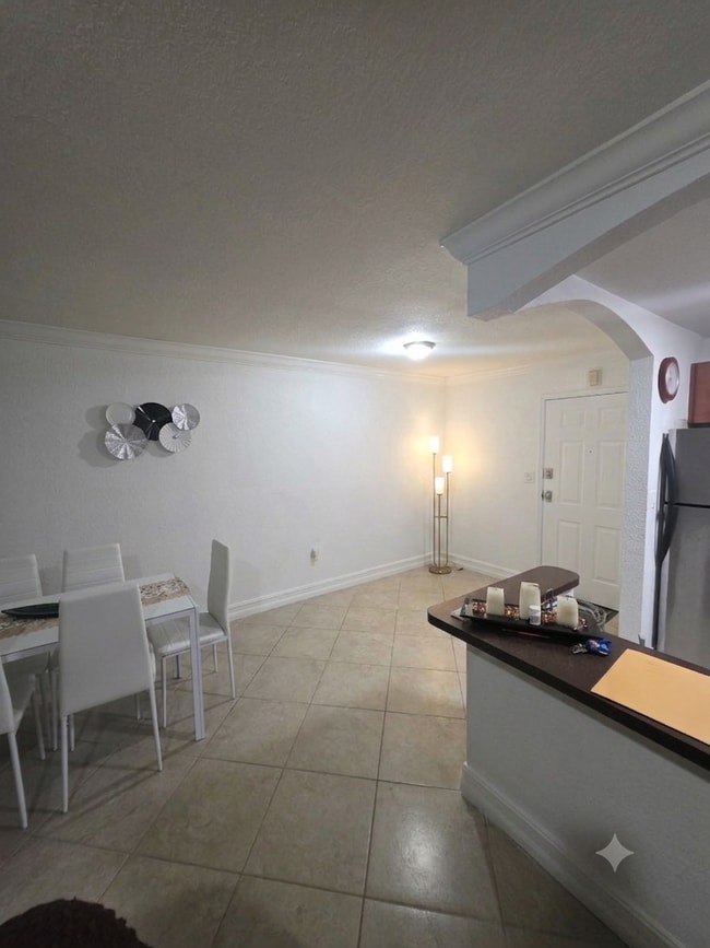 Building Photo - 9483 SW 76th St Unit N-04