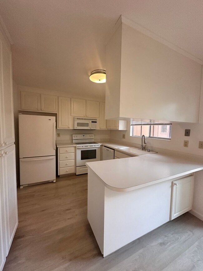 Photo - Unit with updated flooring!
