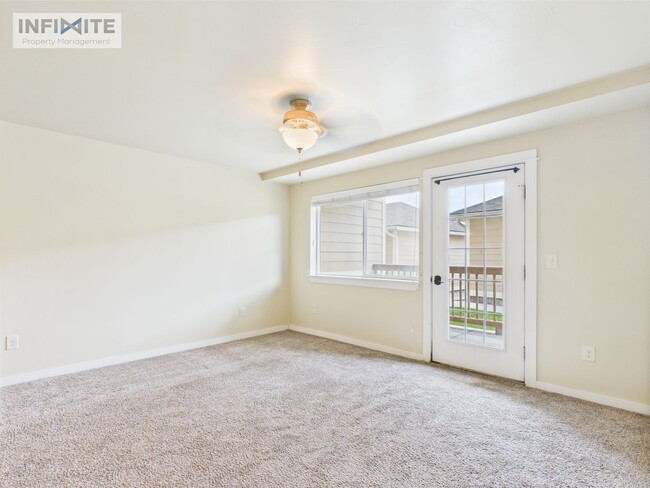 Building Photo - Cute As A Button 2 Bedroom Condo on Baxter Lane!