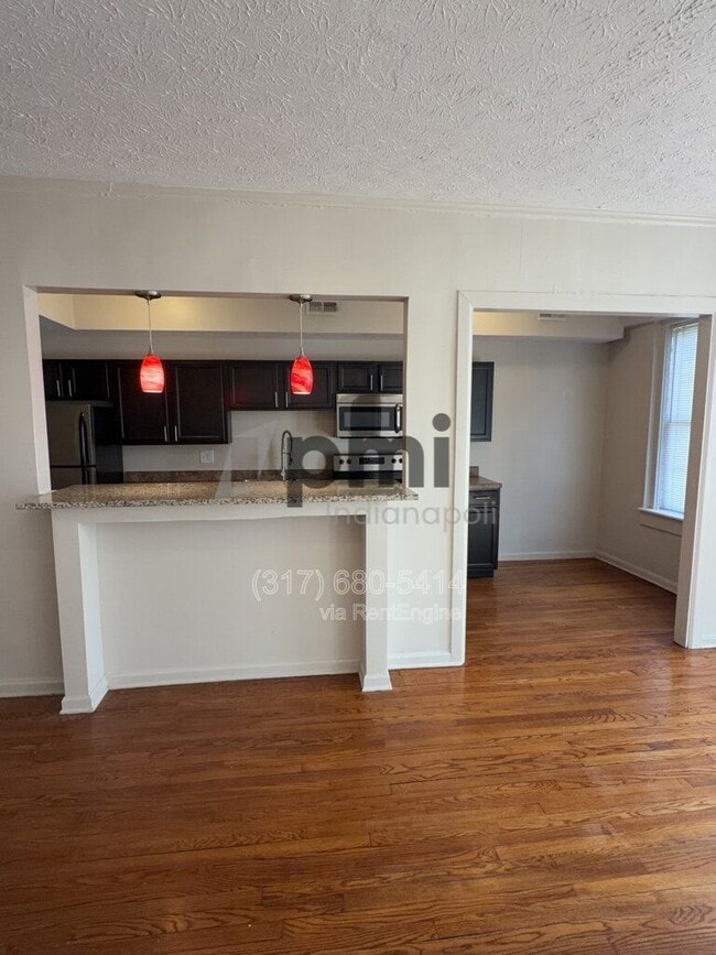 Photo - 1 W 28th St Unidad 208