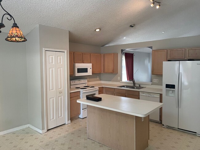 Photo - 3-bedroom, 2-bath home features a 2-car garage