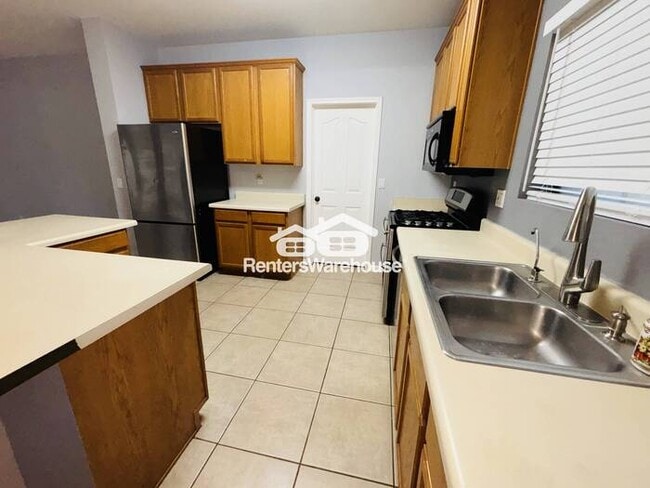 Photo - 5 Bed, 3 bath with a Spa like bathtub, RV Gate and Pool!