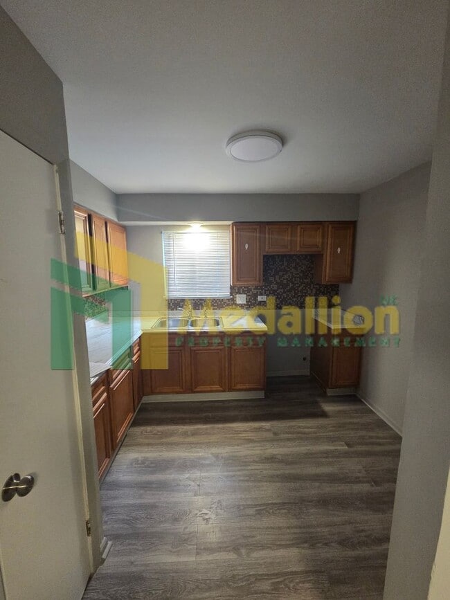 Photo - Updated 5-Bedroom Home with Finished Basement and Fenced Yard