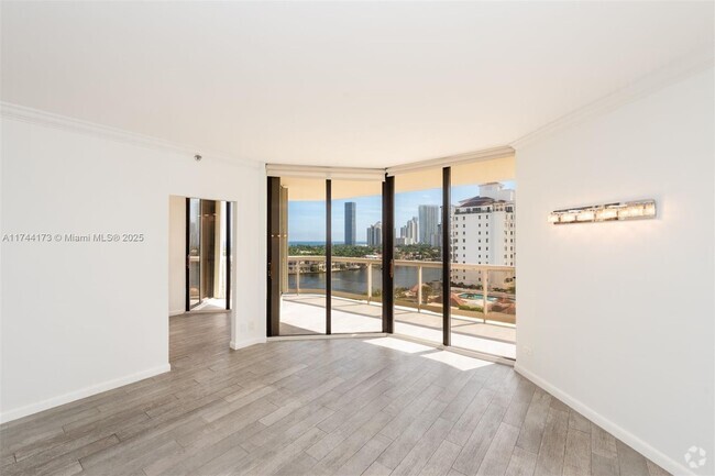 Building Photo - 20191 E Country Club Dr Unit 1009 Rental