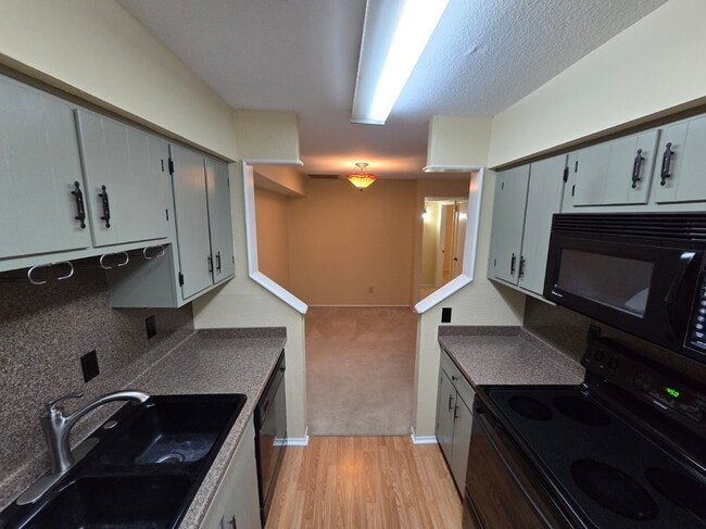 Building Photo - 5669 Birchmont Dr Unit E Rental