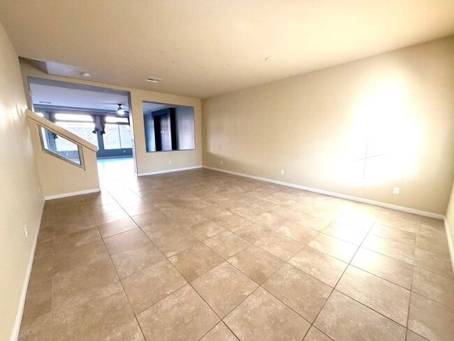 Photo - Spacious 5-Bed, 2.5-Bath Las Vegas Home with Granite Kitchen & Garage