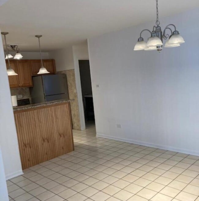 Photo - 10408 Major Ave Unit 1S