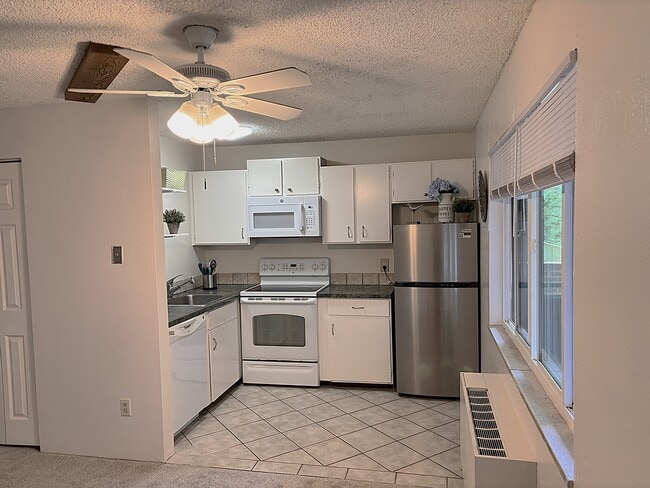 New Fridge, Microwave and Garbage disposal - 3161 Madison Ave Unit R310