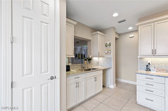 Building Photo - 8081 Players Cove Dr Unit 101