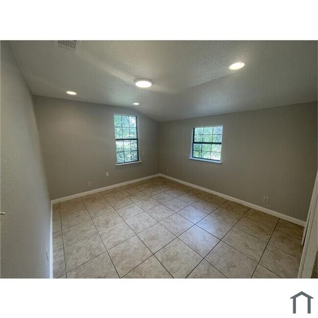 Photo - Discover your dream home in this beautifully renovated four-bedroom, two-bathroom house.