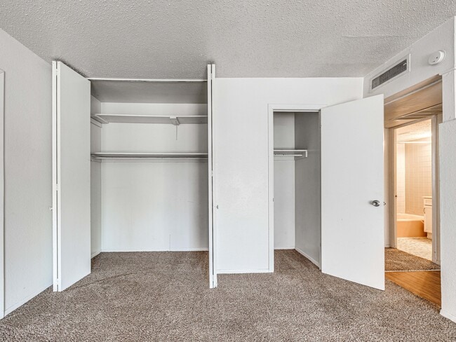 Storage in classic one bedroom living room - Coventry Cove