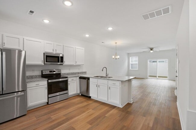 Photo - Large 3 story townhome near beach with community POOL and GYM!